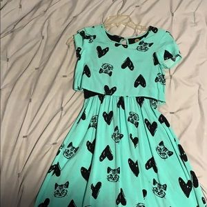 mint green and black kitten design dress